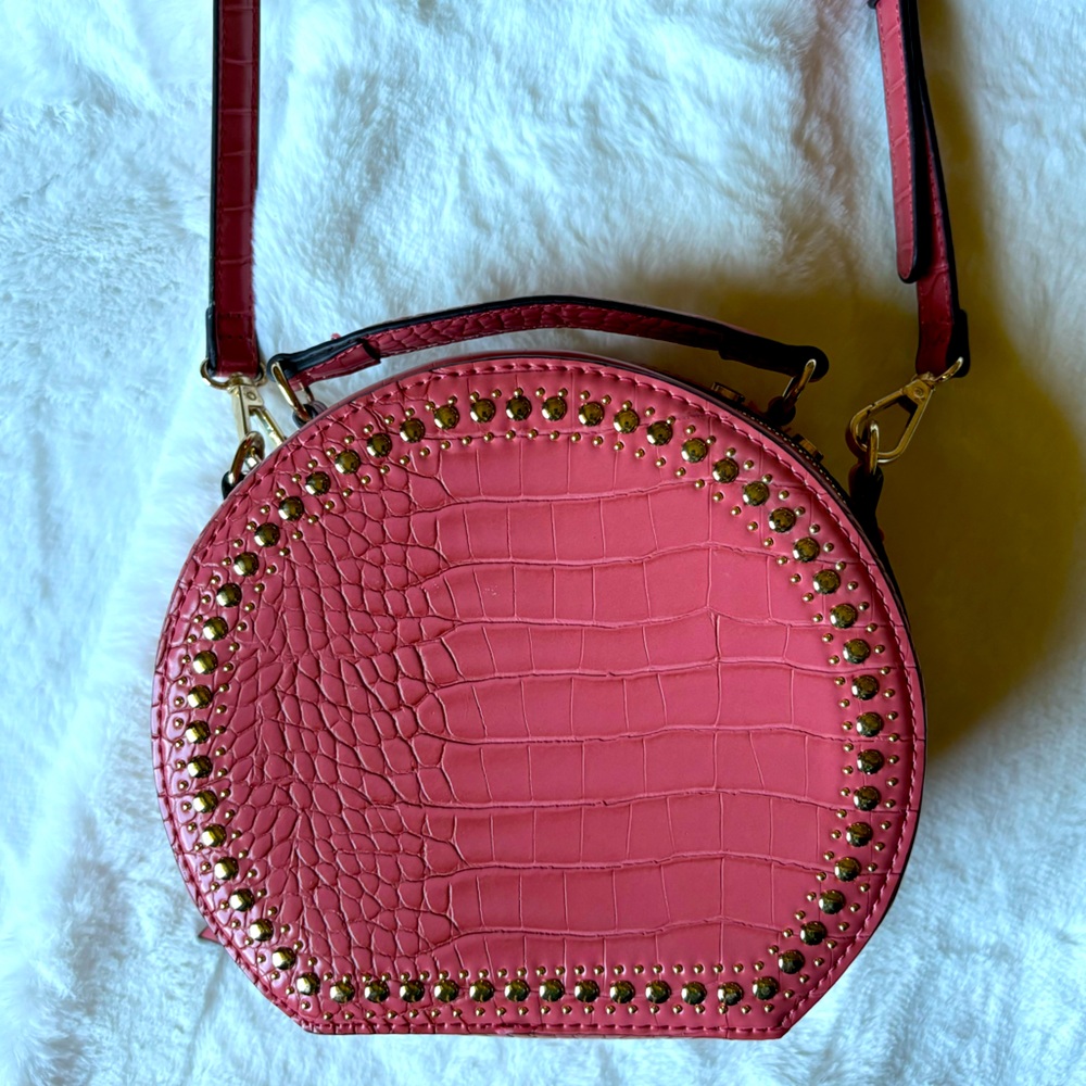 INC coral, hard-sided purse